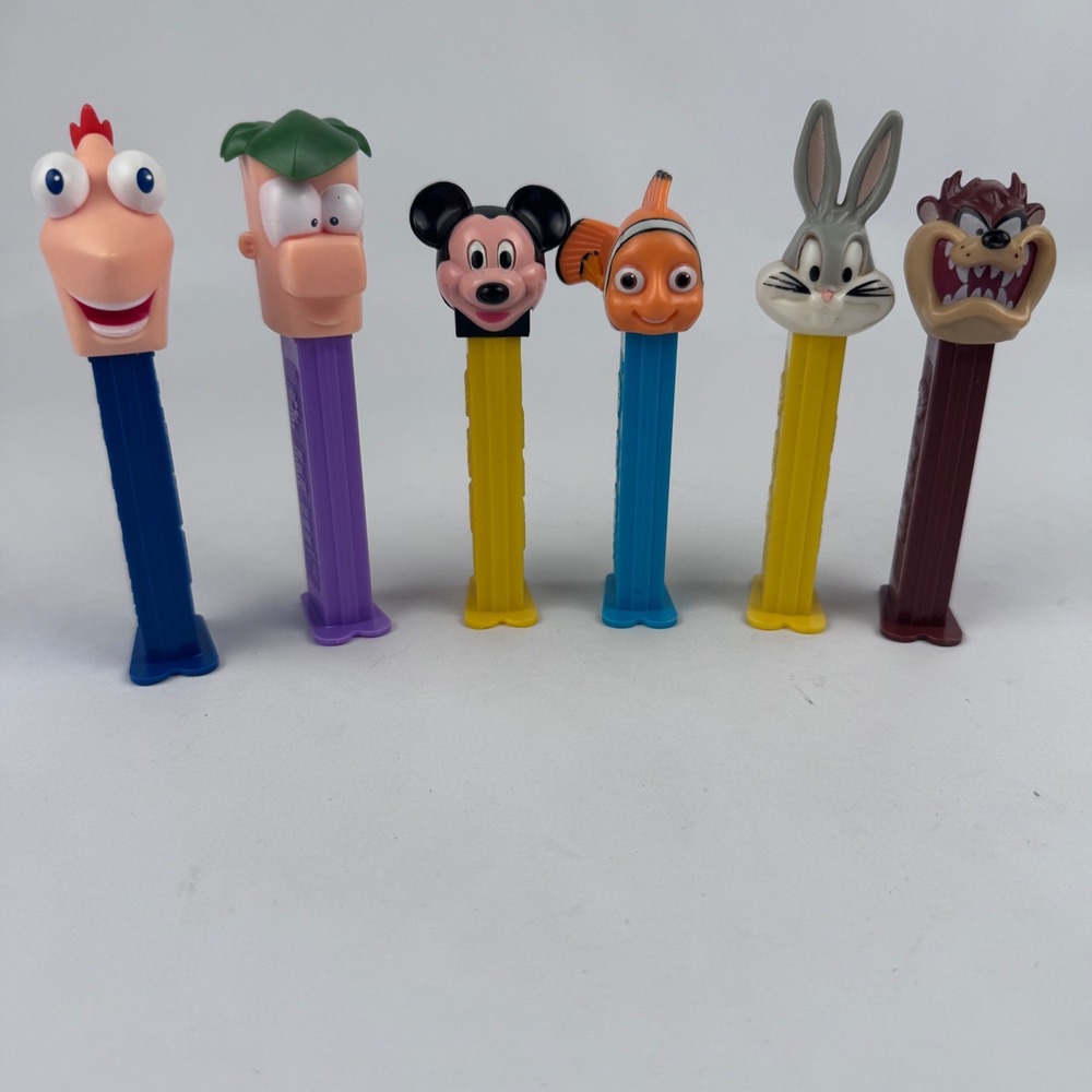 Vintage lot of 6 Pez Dispensers Bugs Bunny Mickey Nemo Taz